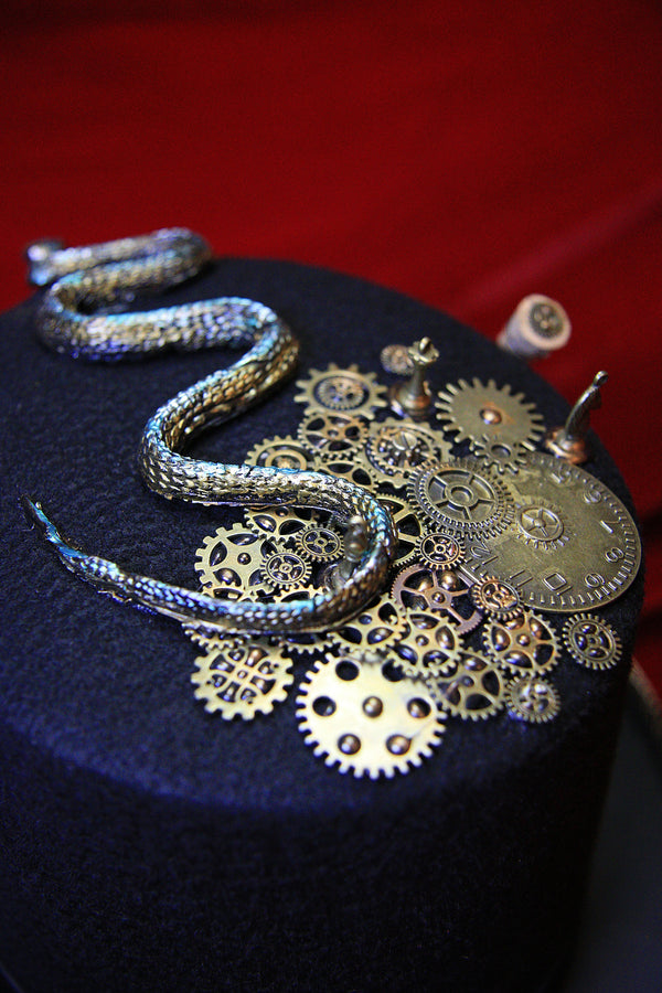 Steampunk Gear-Embellished Top Hat (Green Snake Carrying Lamp)